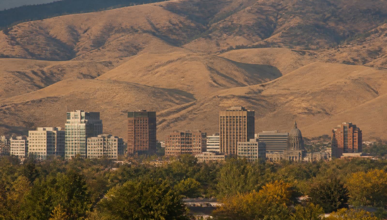 Downtown Boise, Idaho with the Boise foothills rising behind the skyline